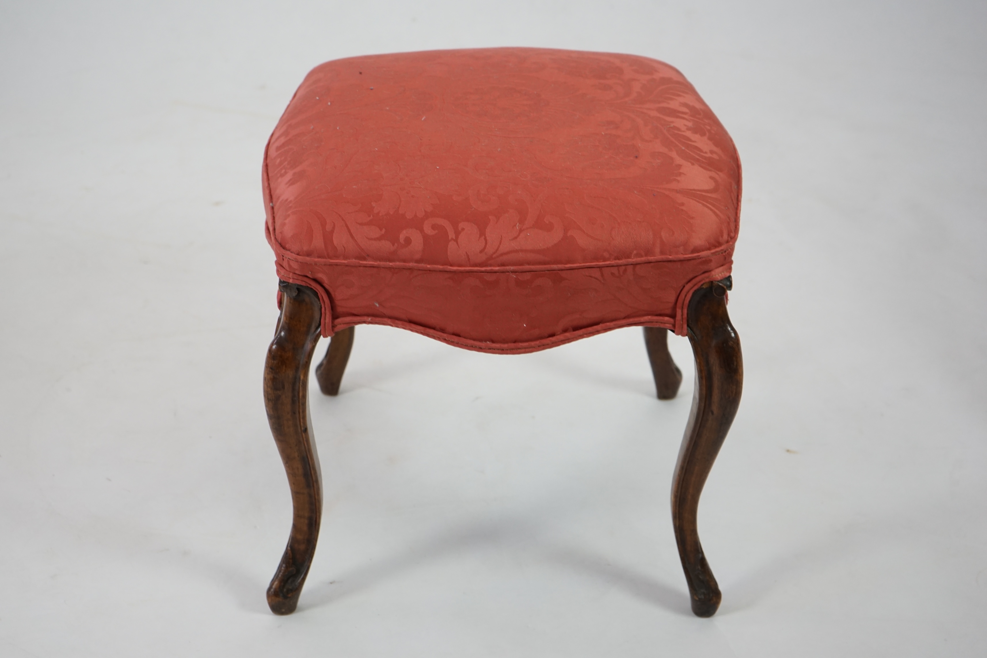 A Victorian mahogany dressing stool